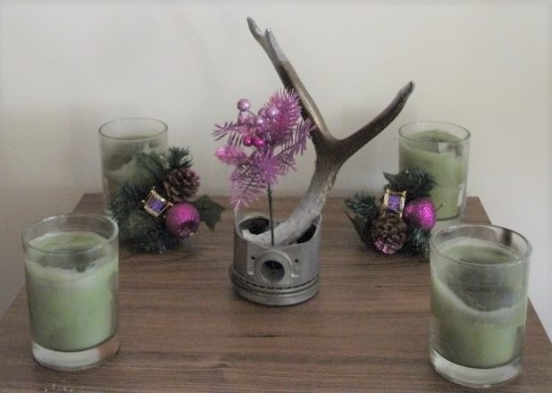 Add sparkly purple-painted pine and holly sprigs for a magical winter altar