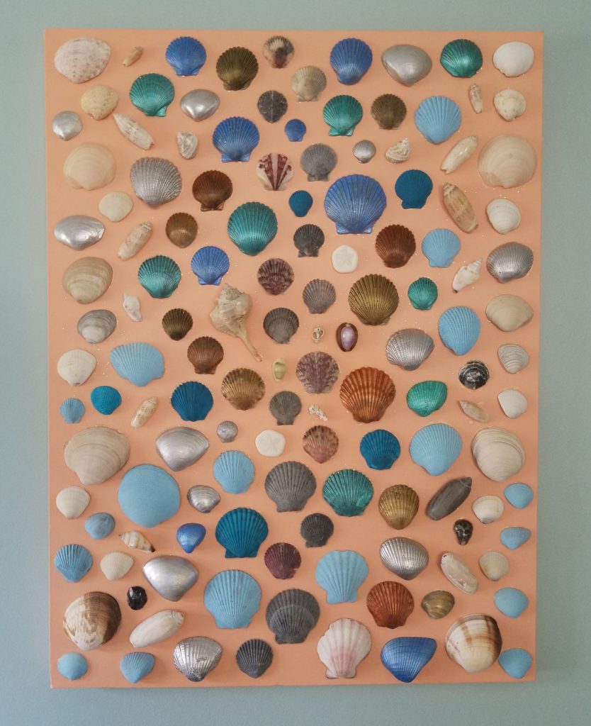 If you love shells, create a large collage to hang in your bedroom
