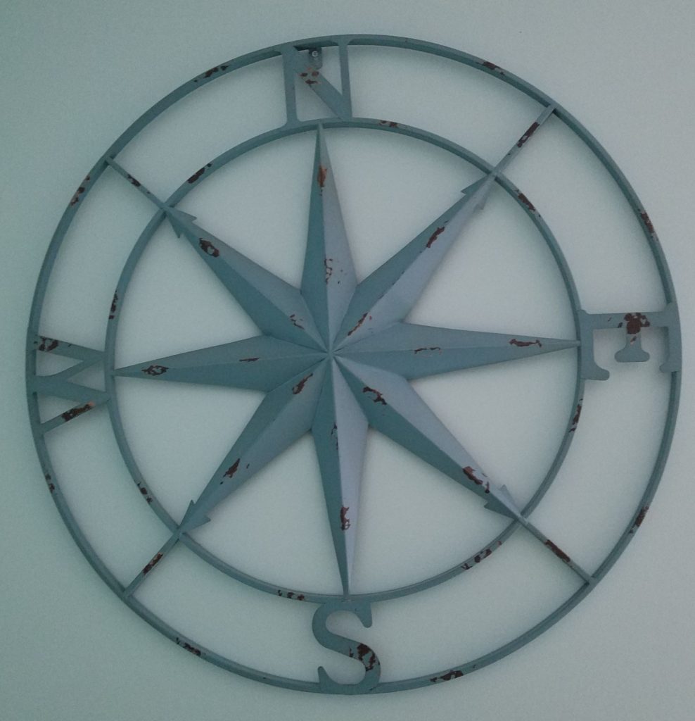 Compass rose (mass-produced and sold at various consignment shops), from antique store