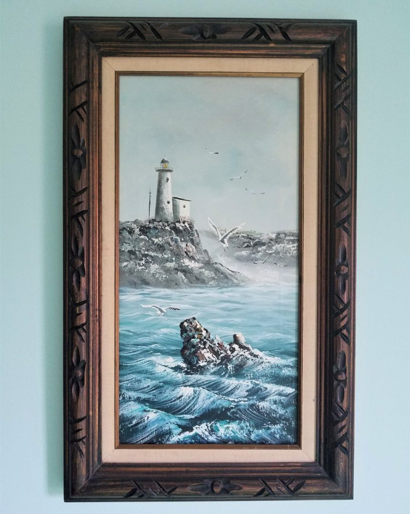 The perfect nautical painting for the Captain's Quarters: waves crashing against a rock coast