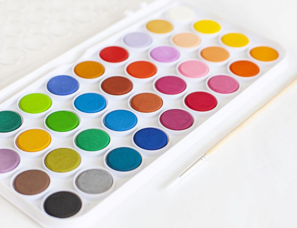 A fresh set of watercolors is a delightful gift for an aspiring artist