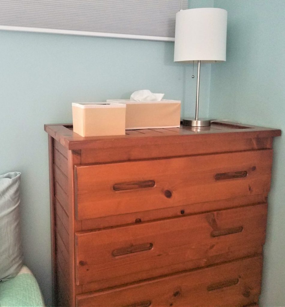 Another corner lit by a simple table lamp