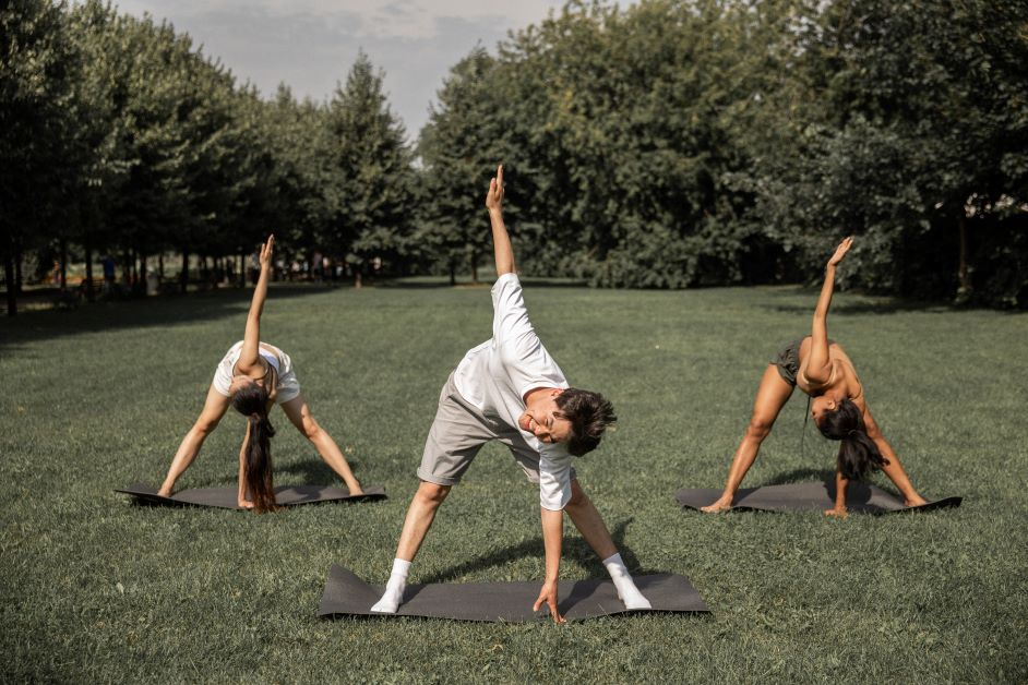 Group stretching outdoors is great for health