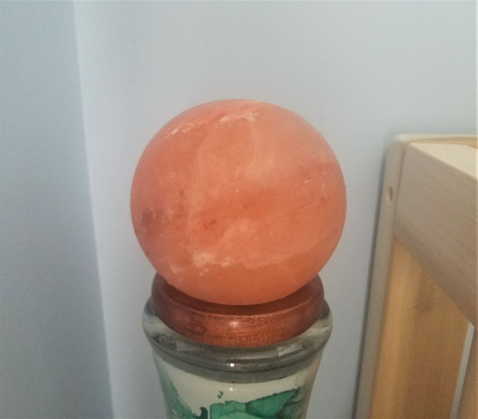 Colour-changing salt lamp globe gives a calm nursery glow