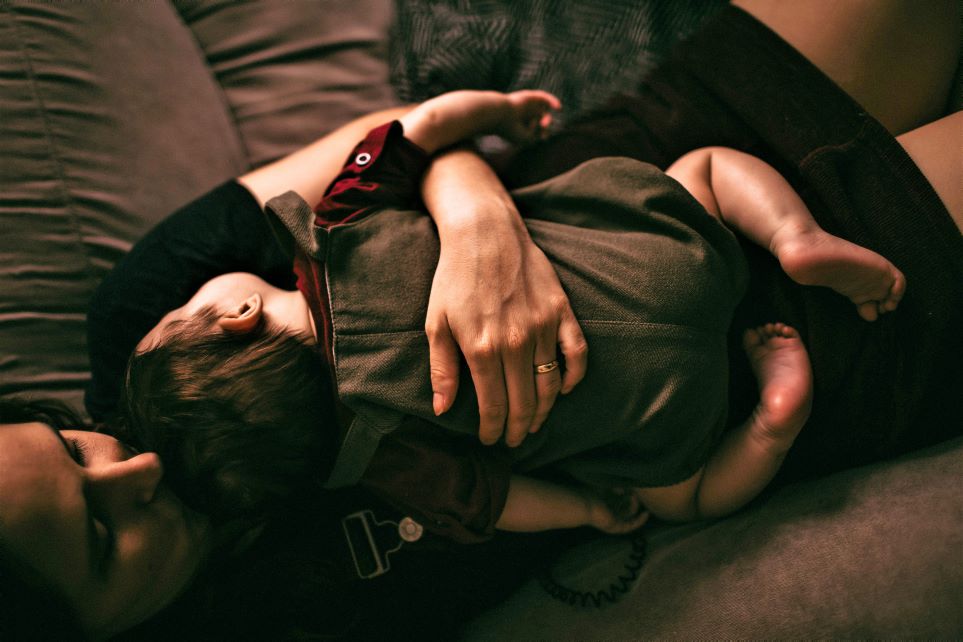 Toddler asleep on mama