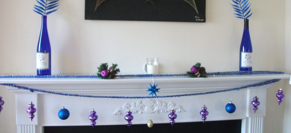 Christmas balls strung across mantel