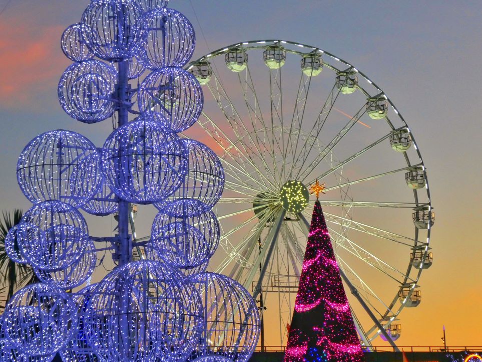 Outdoor pink Christmas tree at Ferris wheel
