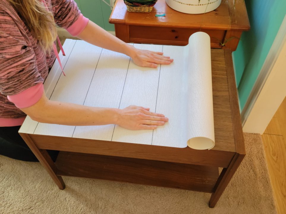 Continuing to adhere paper