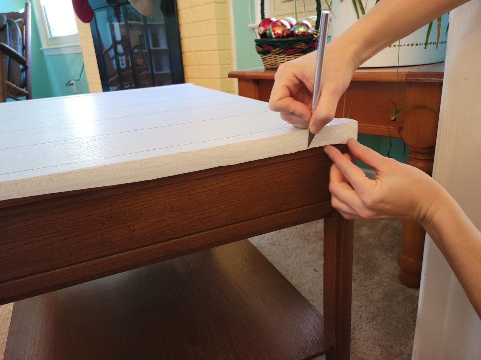 Carefully trimming with X-Acto knife