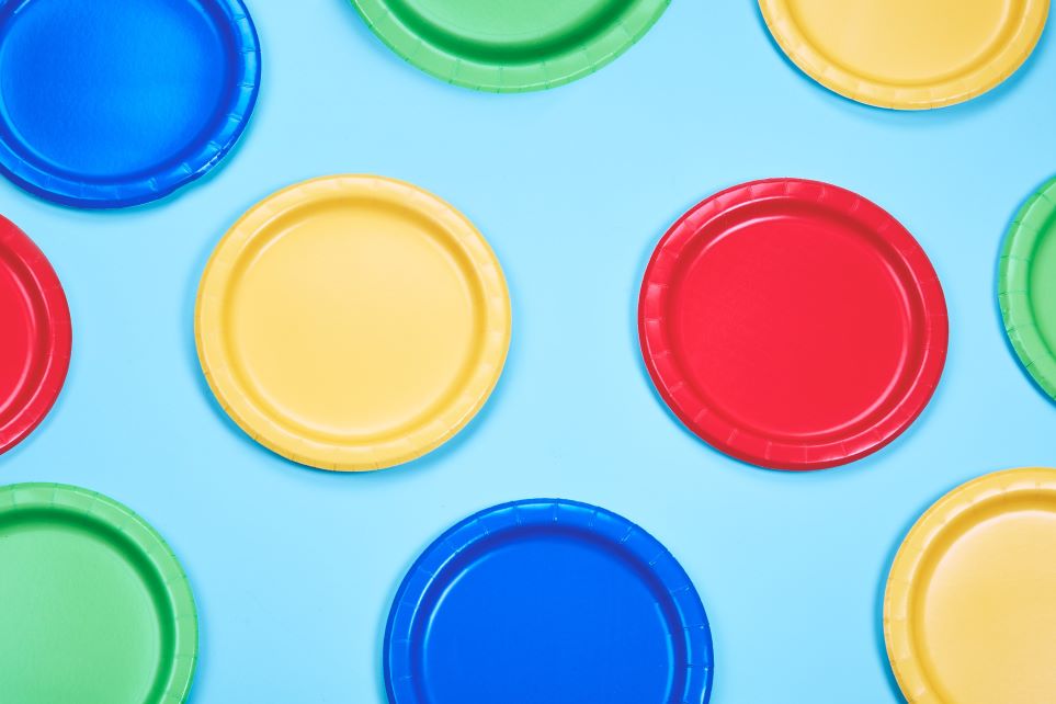 Happy paper plates in primary colors