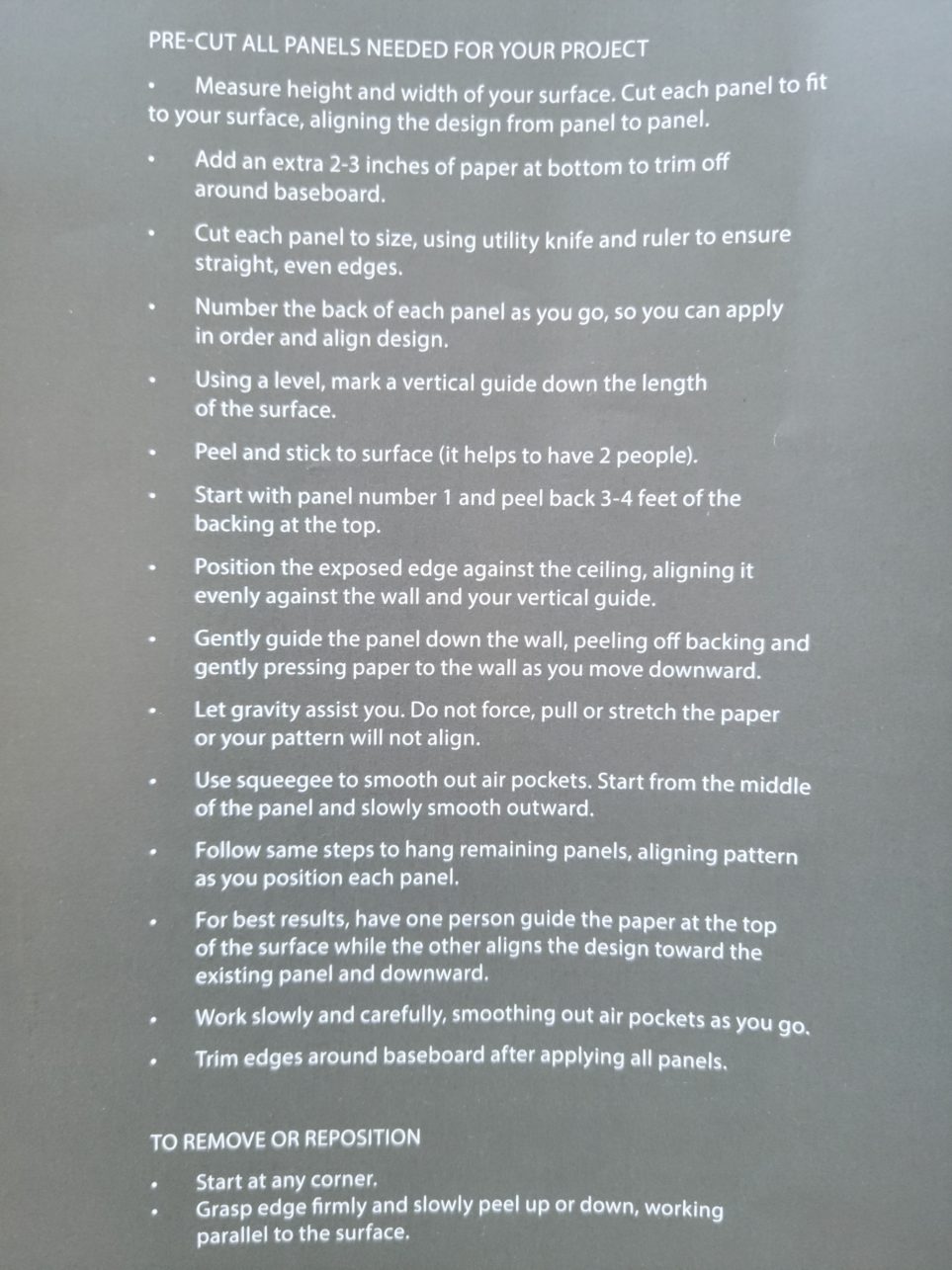 Shiplap peel and stick wallpaper instructions for adhering to a wall