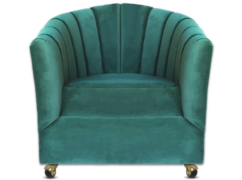 Emerald green velvet tufted armchair