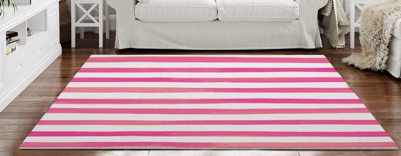pink and white striped area rug