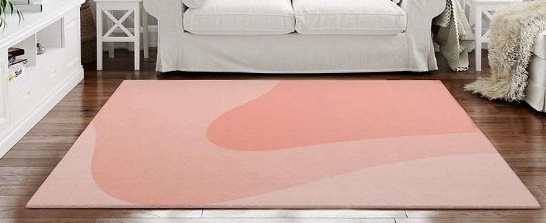 flowing colour block area rug in peach, peony and ballet pink