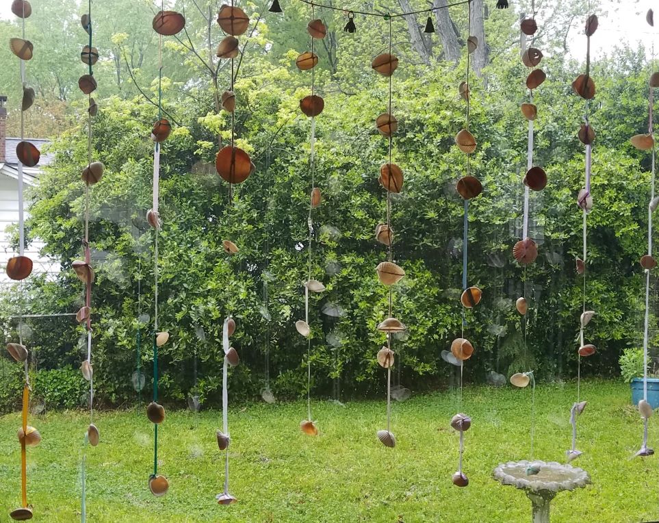 Homemade seashell bird decoy is functional decor that prevents bird casualties