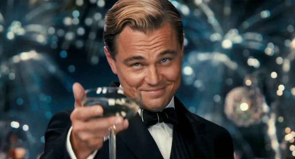 Leonard DiCaprio as The Great Gatsby raising a glass to toast with iconic smile on face (popular meme) because 'it's a pretty kitchen'