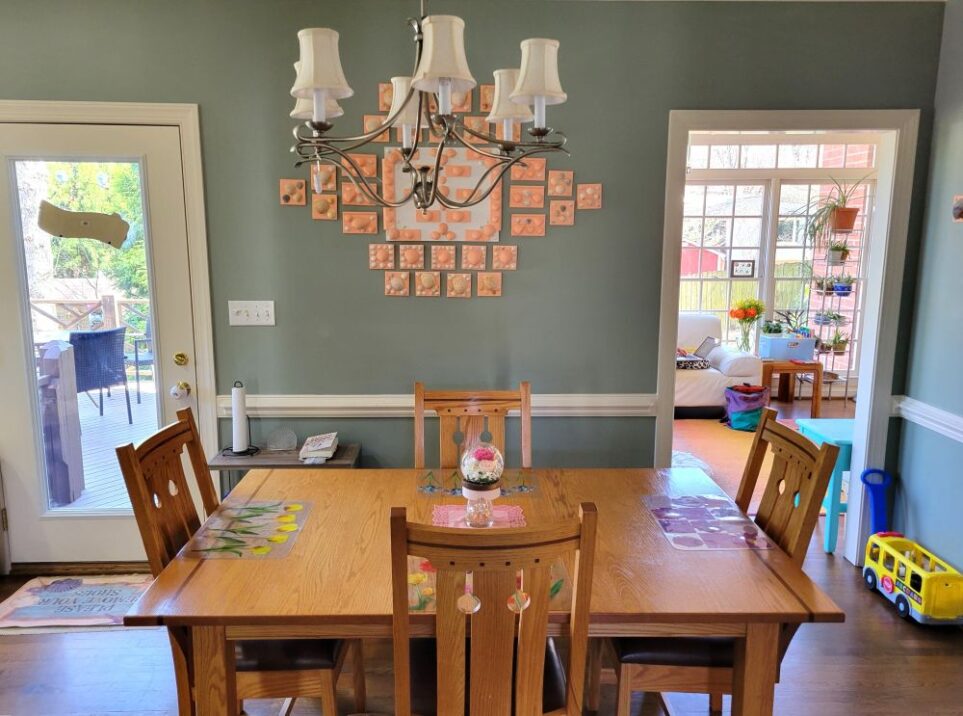 View of breakfast area of kitchen facing the table and back door (standing at the console table).