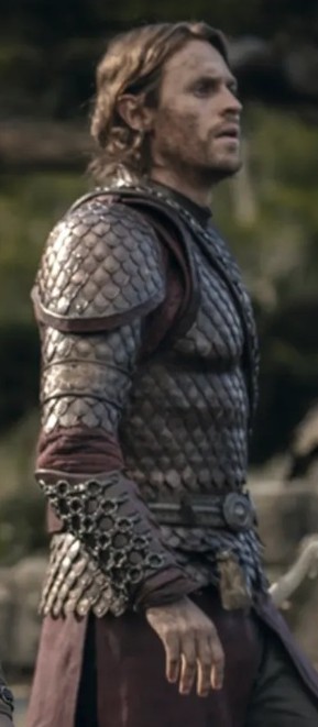 View of Halbrand (version of Sauron) in The Rings of Power, while wearing armor for the battle in the Southlands