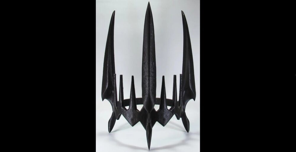 Imitation crown of Sauron (originally, Morgoth) resting on white surface. Even shapeshifting dark lords make classy Halloween costumes