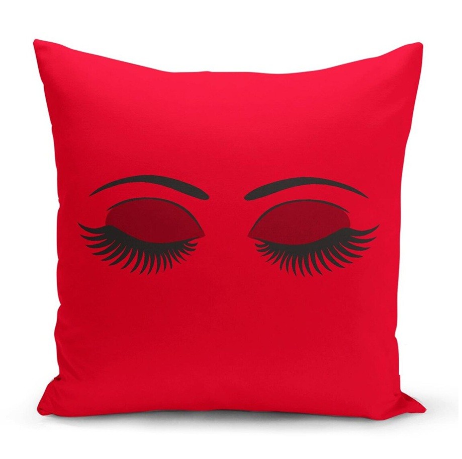 A bright red throw pillow with closed eyes and eyebrows, with eyeshadow and long black eyelashes - a delightfully feminine and bold lovecore decor find!