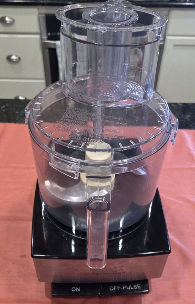 This Cuisinart food processor is one of the most useful household products for serious household cooks. Though super hot food shouldn't be processed due to it being made of plastic, it makes blending large quantities of everything else a breeze.